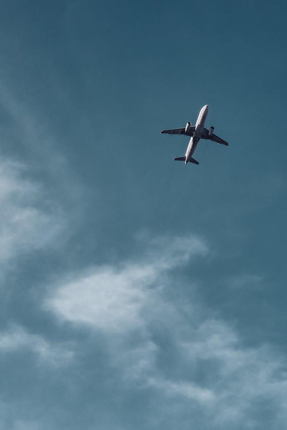 an_airplane_across_the_blue_sky