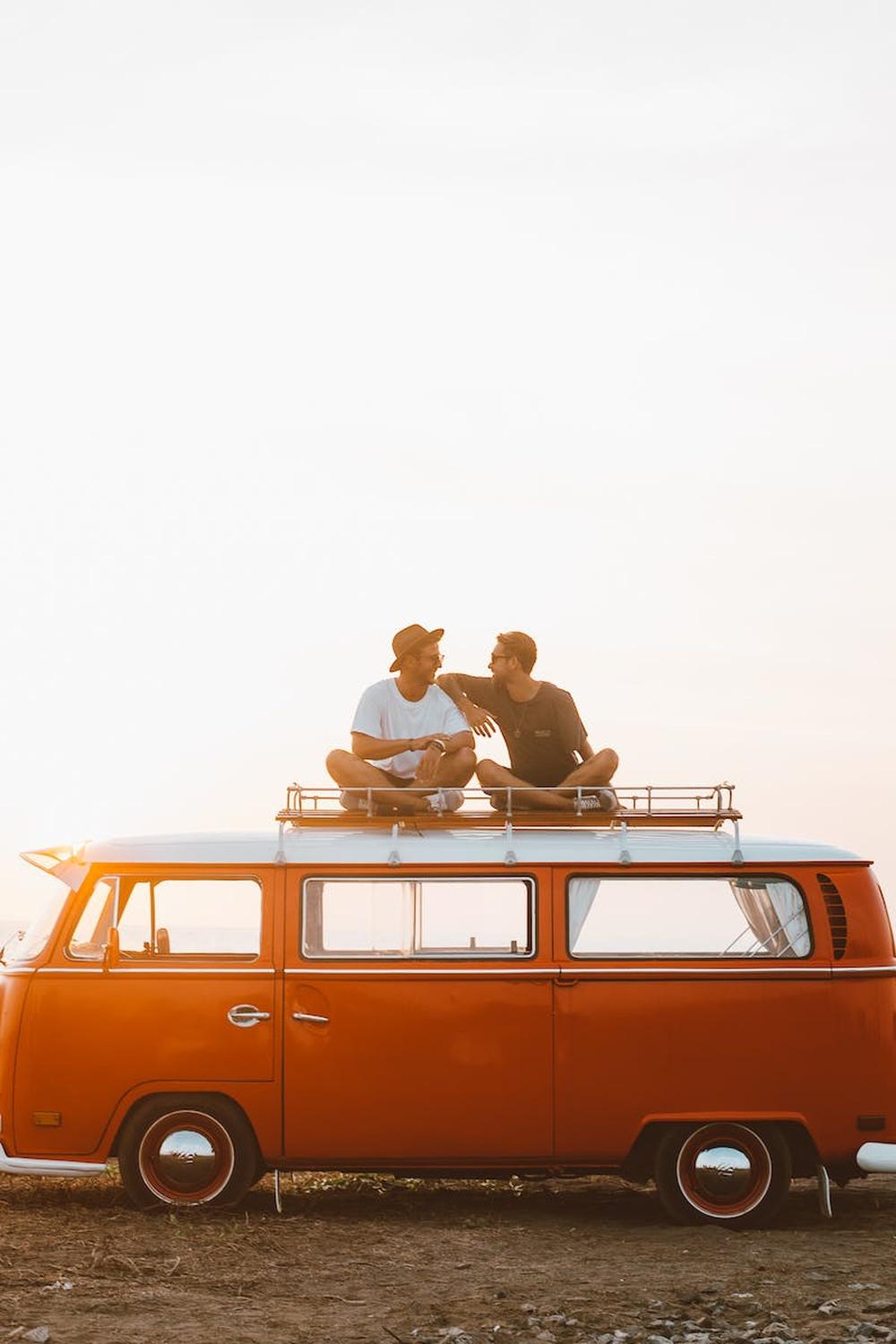 happy_friends_on_camper_van_roof